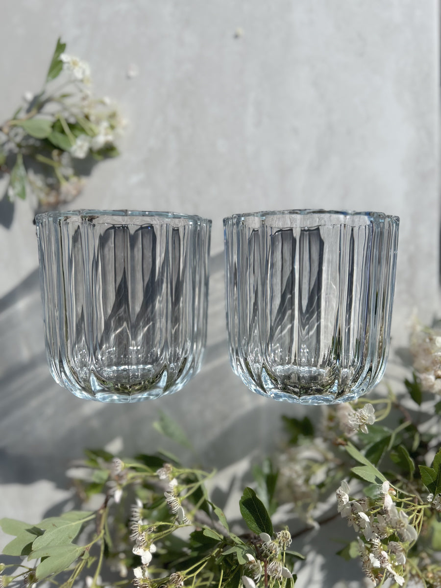 The Vase Duo in softly ribbed glass – elegant design for flowers, candles or quiet styling moments.
