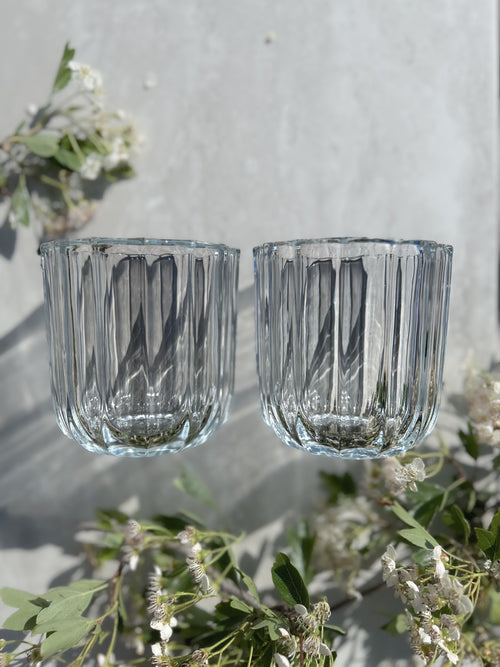 The Vase Duo in softly ribbed glass – elegant design for flowers, candles or quiet styling moments.