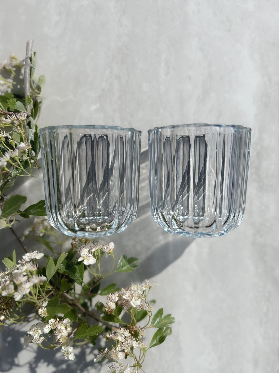 The Vase Duo in softly ribbed glass – elegant design for flowers, candles or quiet styling moments.