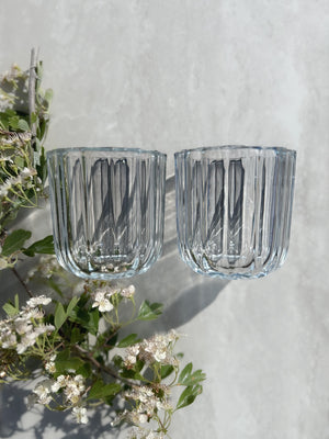 The Vase Duo in softly ribbed glass – elegant design for flowers, candles or quiet styling moments.